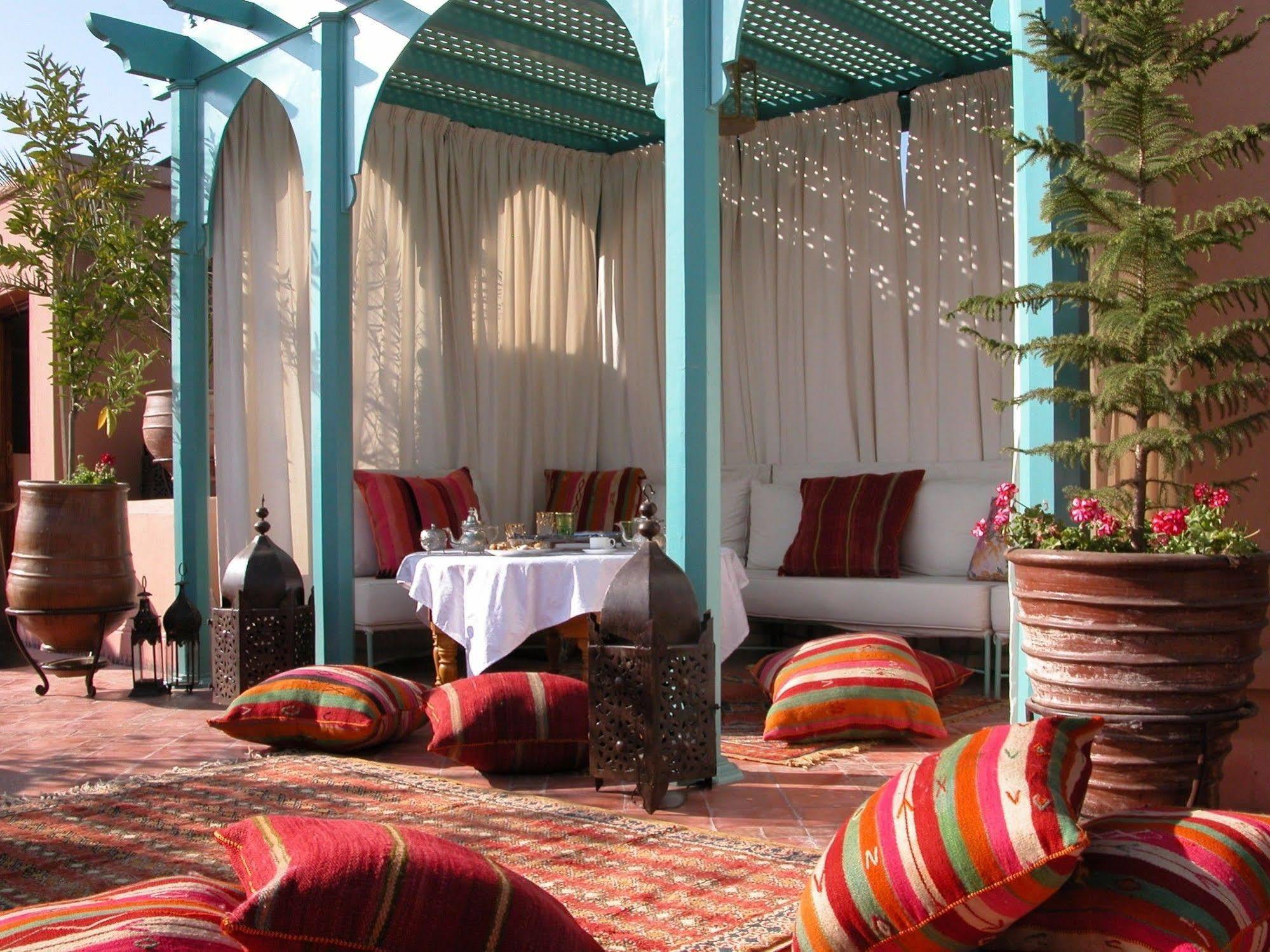 Riad Kniza Марракеш Екстер'єр фото Roof terrace at the Hotel Amanjena